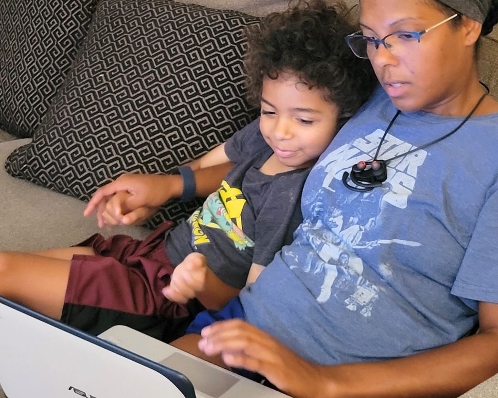 Mom and son using Elephango on the computer